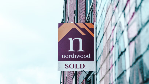 Sold sign on real estate property